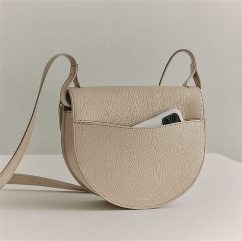 cuyana double moon saddle bag.